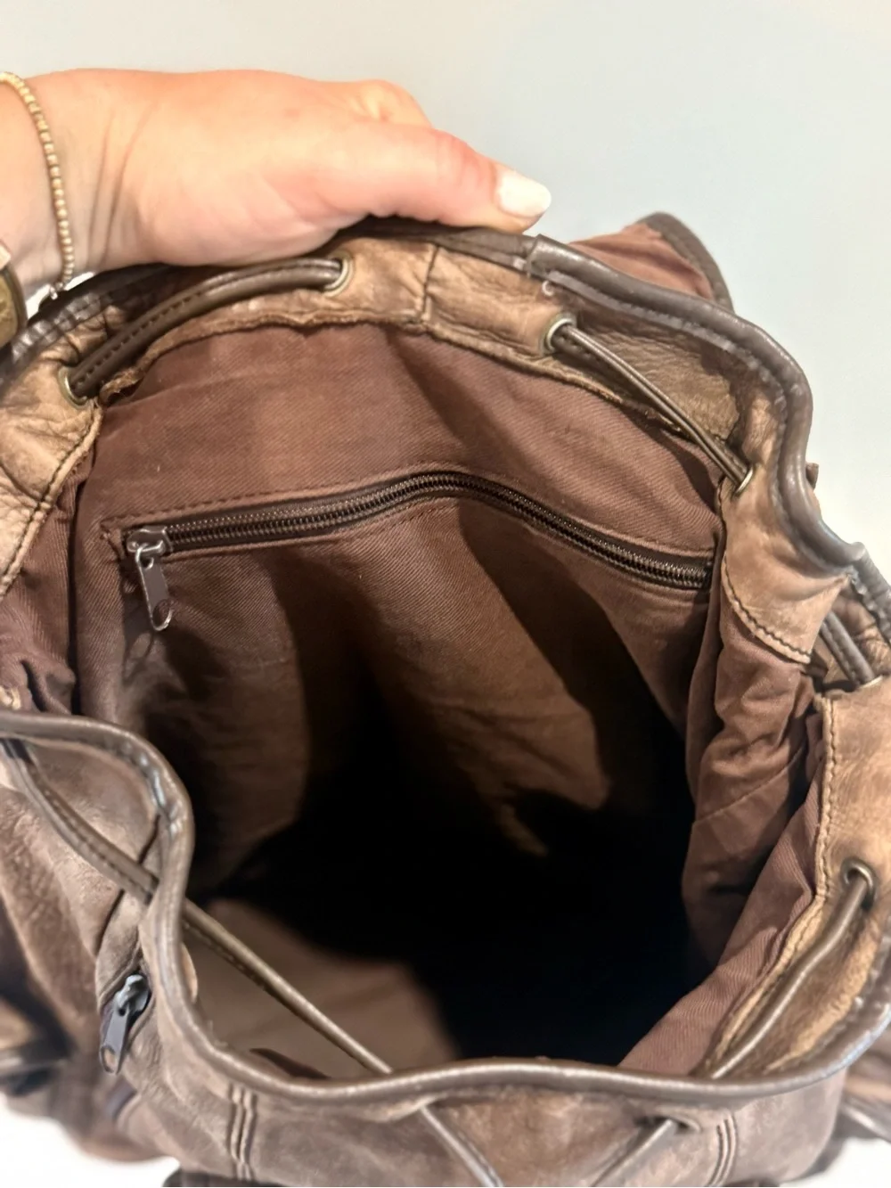 Men's Brown Leather Backpack with Front and Side Pockets